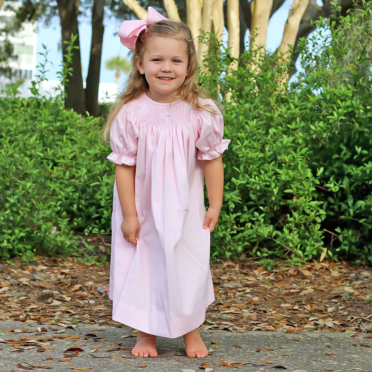 Cross Smocked Pink Pique Bishop Dress - Image 3