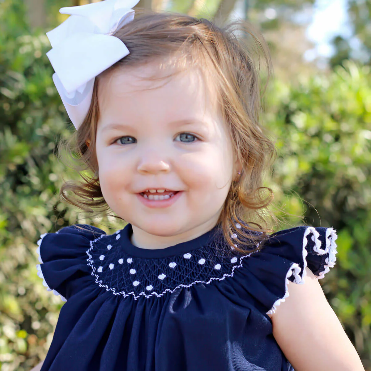 White Geometric Vine Smocked Bubble Navy Pique - Image 3