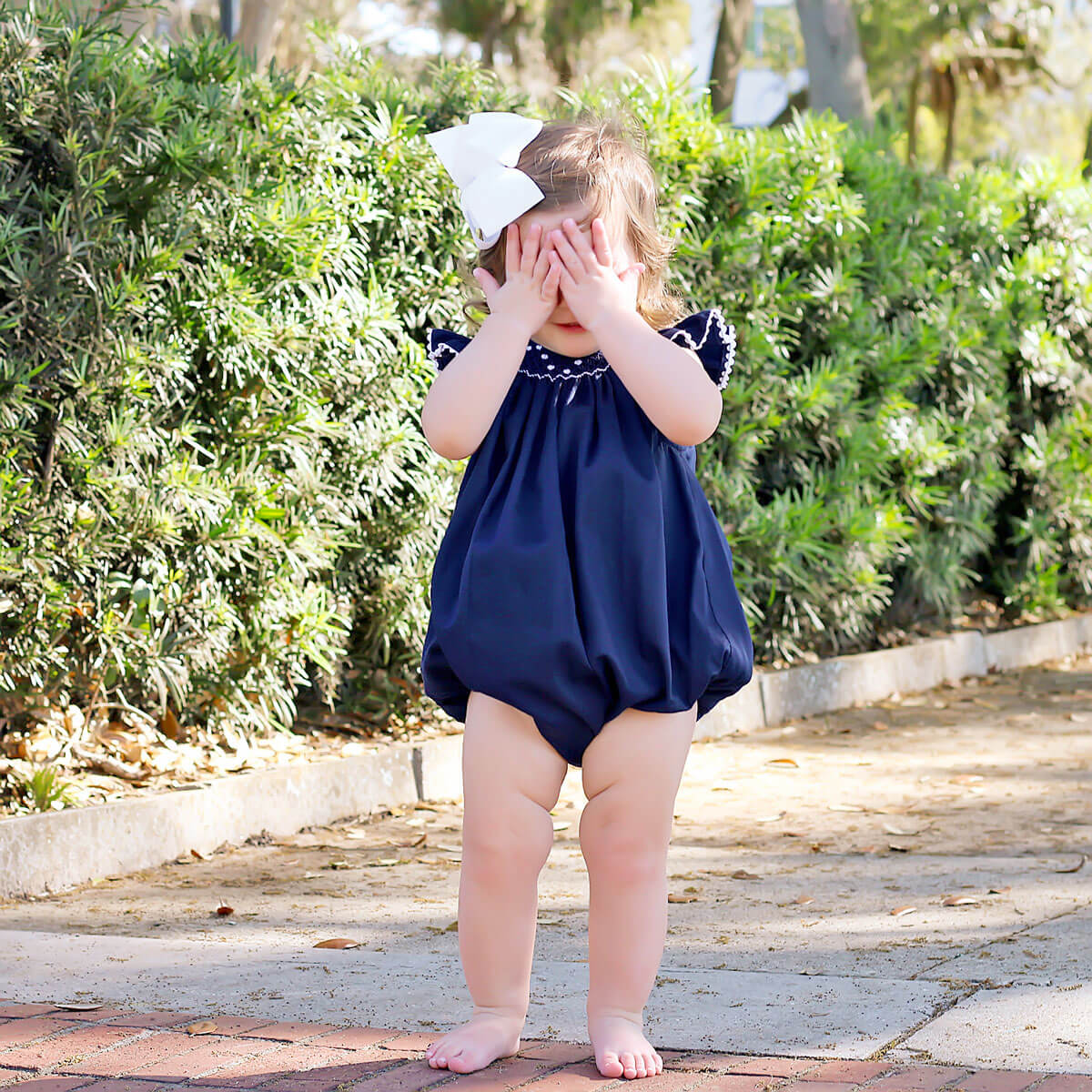 White Geometric Vine Smocked Bubble Navy Pique - Image 4