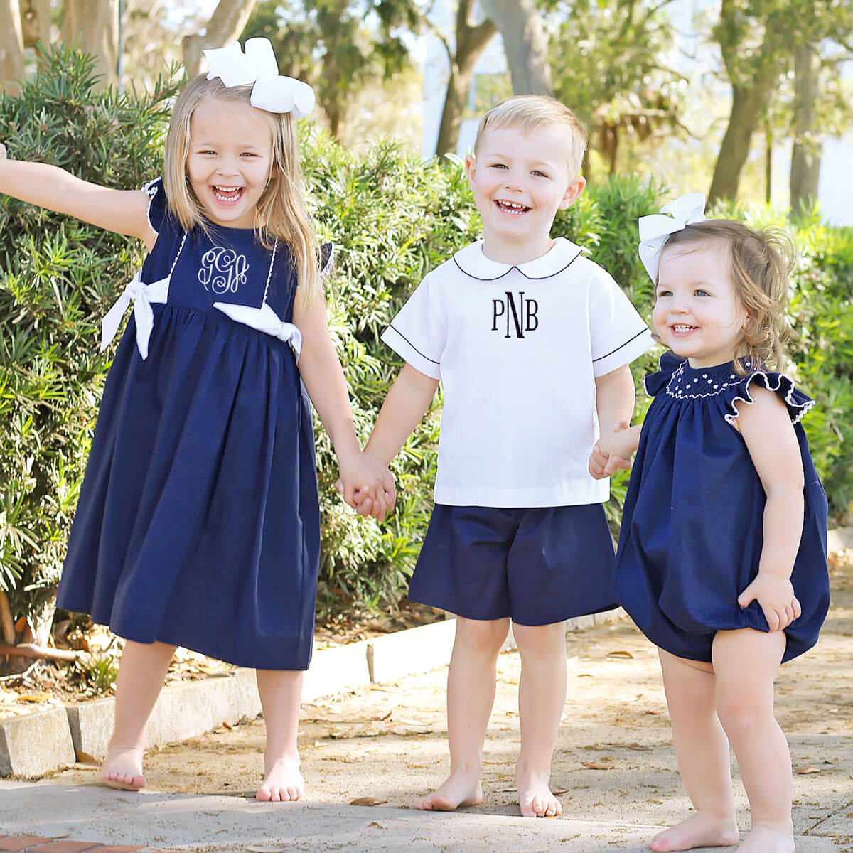 White Geometric Vine Smocked Bubble Navy Pique - Image 5